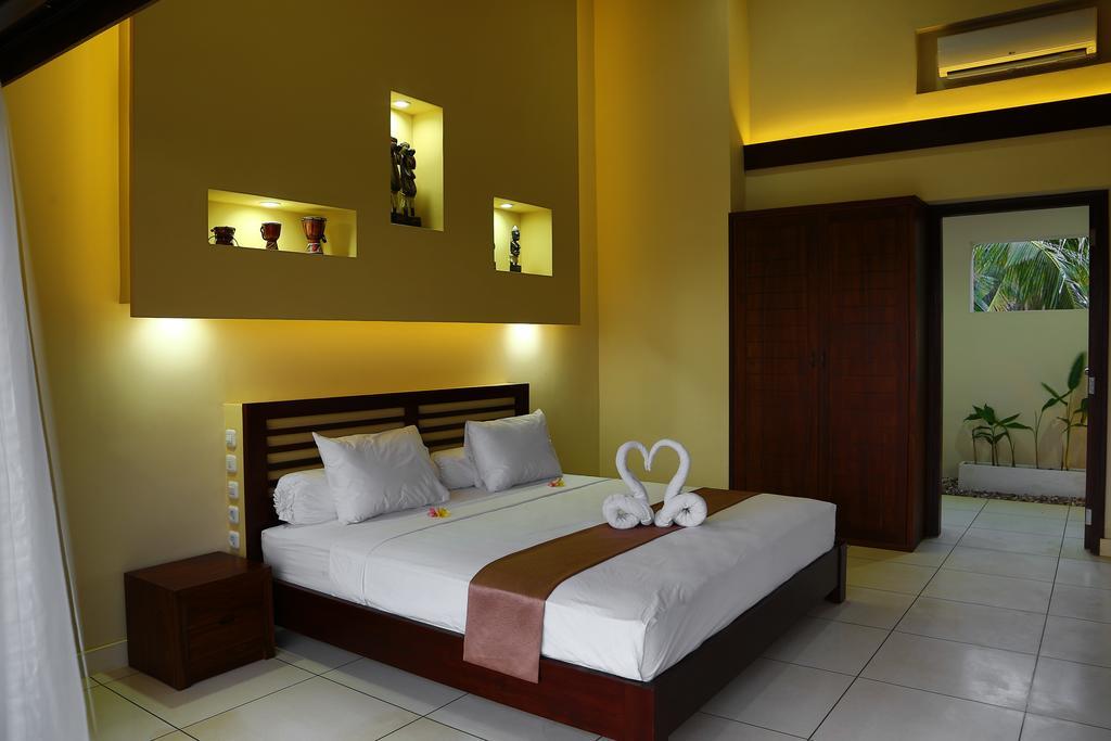 มาลา การ์เดน รีสอร์ต Hotel กีลีตราวางัน ห้อง รูปภาพ
